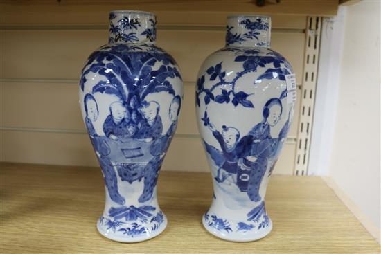 Two Chinese blue and white vases and covers